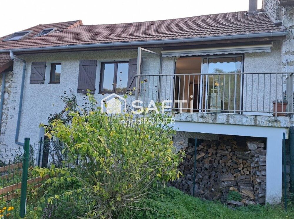 Maison en pierre avec terrain et un garage