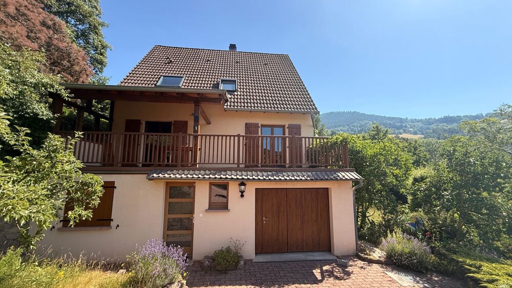 Maison 3 / 4 chambres avec vue montagne, grande terrasse couverte, garage et atelier à Fréland