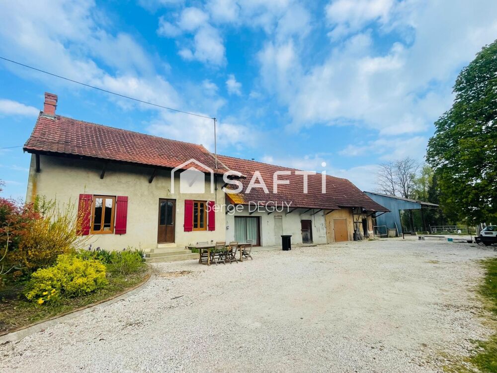 HABITATION rénovée avec dépendances et hangar métallique ouvert
