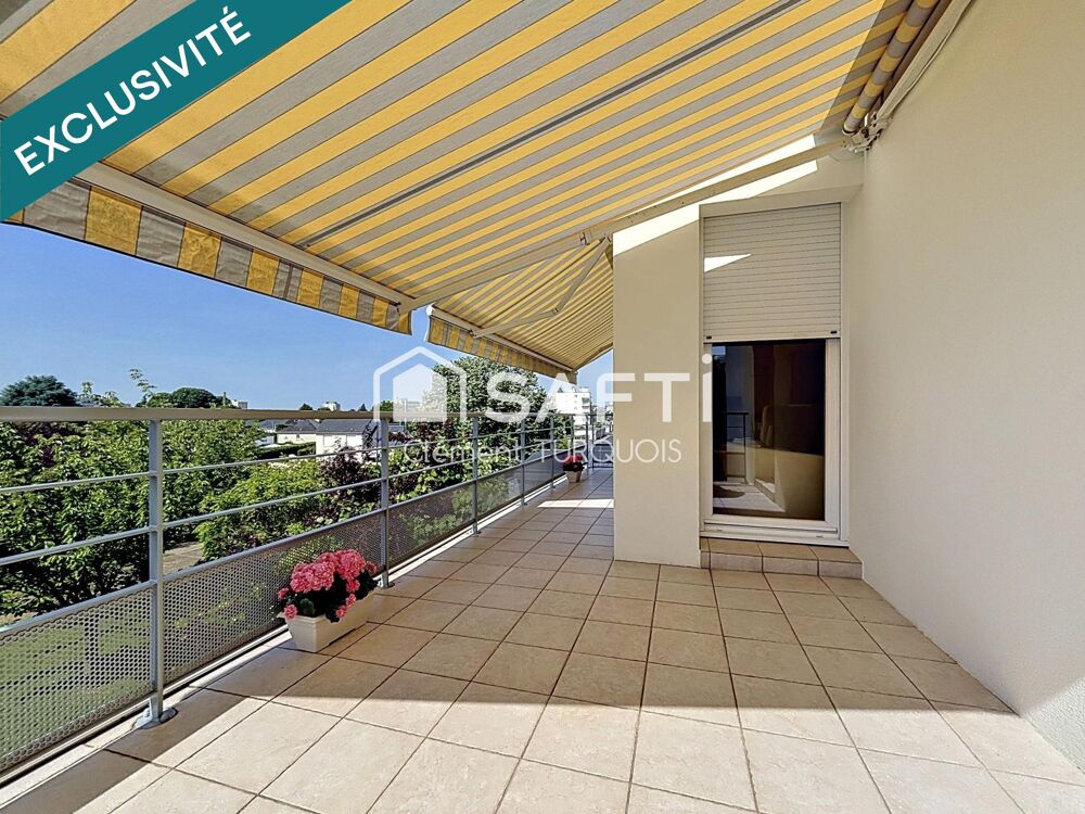 Appartement T4 de 96 m² avec terrasse, garage et parking dans résidence recherchée
