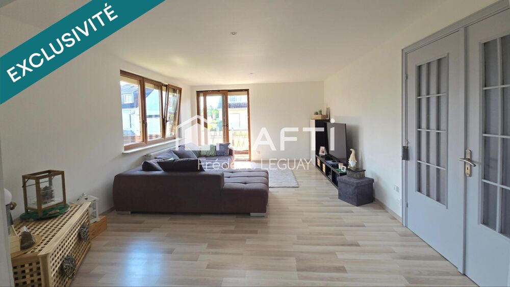 Appartement rénové avec jardin, cave et garage