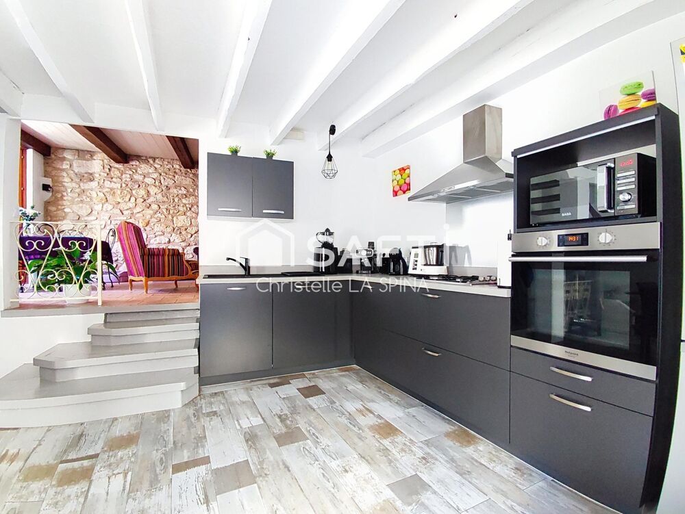 Maison de caractère avec garage et terrasse  3 chambres