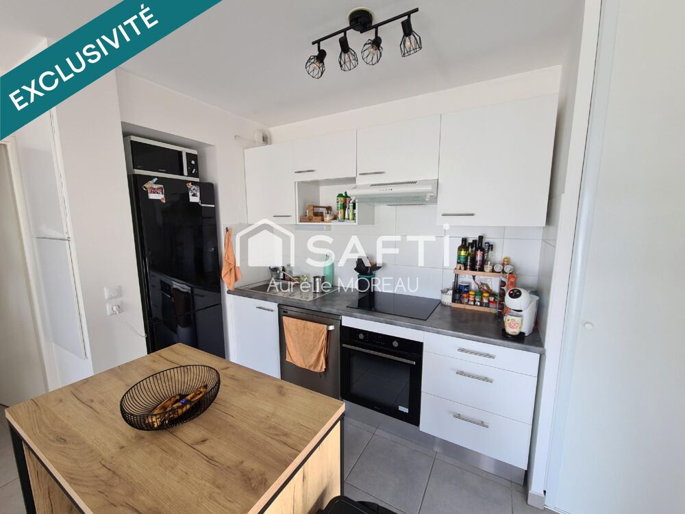 Appartement T3 balcon deux places de parking