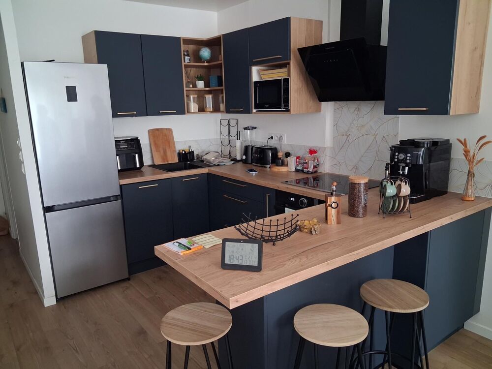 Appartement T3 de 71 m2 avec jardin privatif et 2 places de stationnement