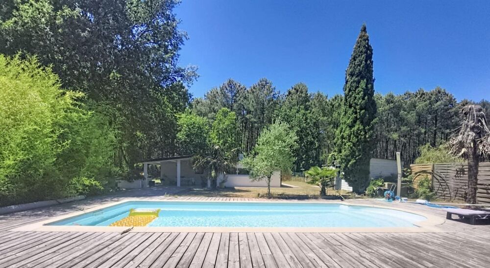 MAISON FAMILIALE AVEC PISCINE SUR 1.4 HECTARE DE TERRAIN