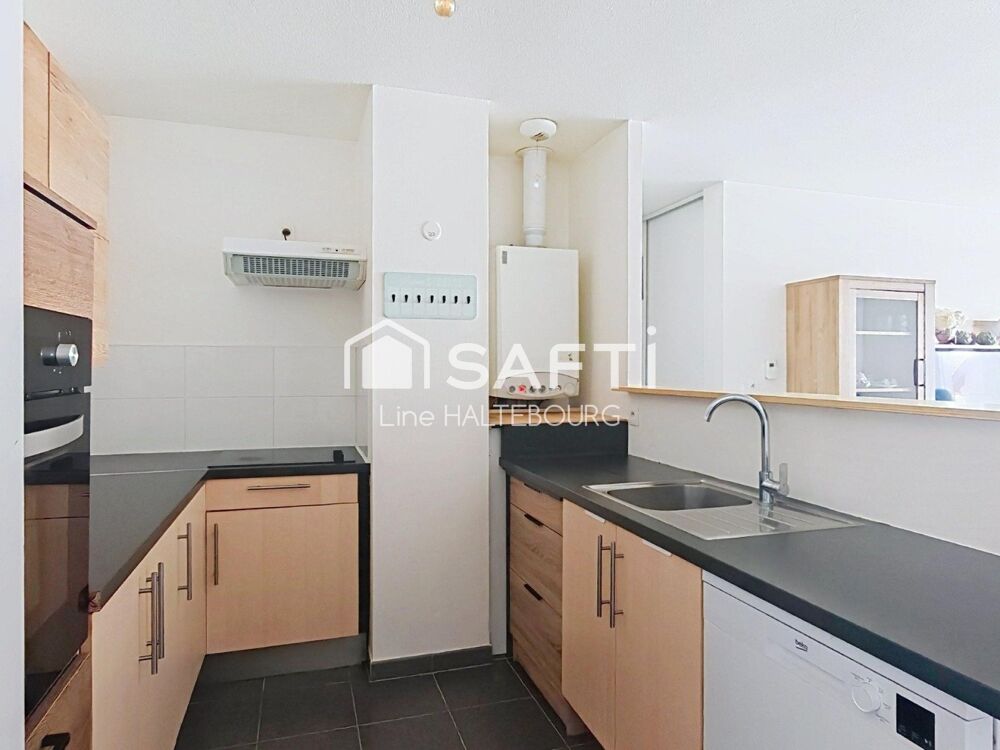 Vente Appartement Grand F2 de 56 m² en dernier étage avec terrasse , garage et parking Kembs