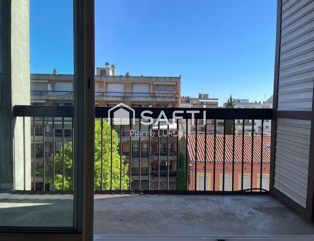Appartement T5 rénové avec balcons et stationnement