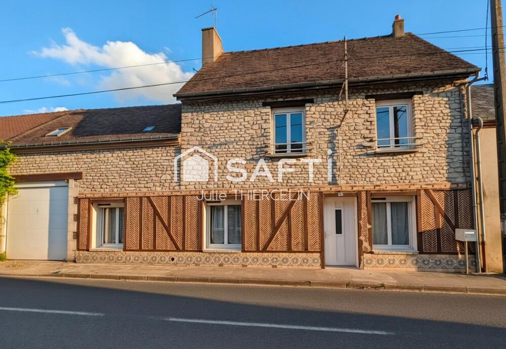Maison avec 4 chambres et un garage
