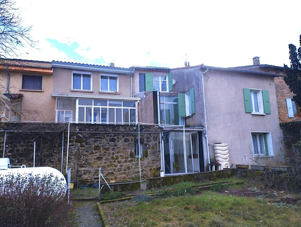 Maison de ville avec garage et jardin à quelques pas du centre ville