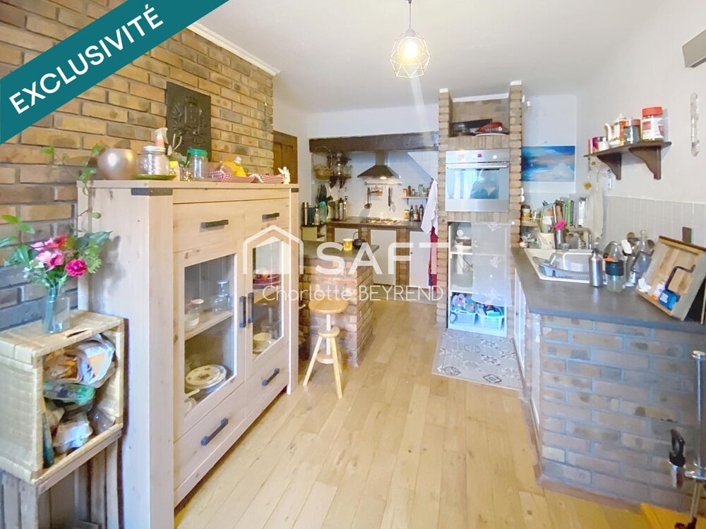 Maison atypique de 160m2 avec patio, double garage et jardin de 360m2