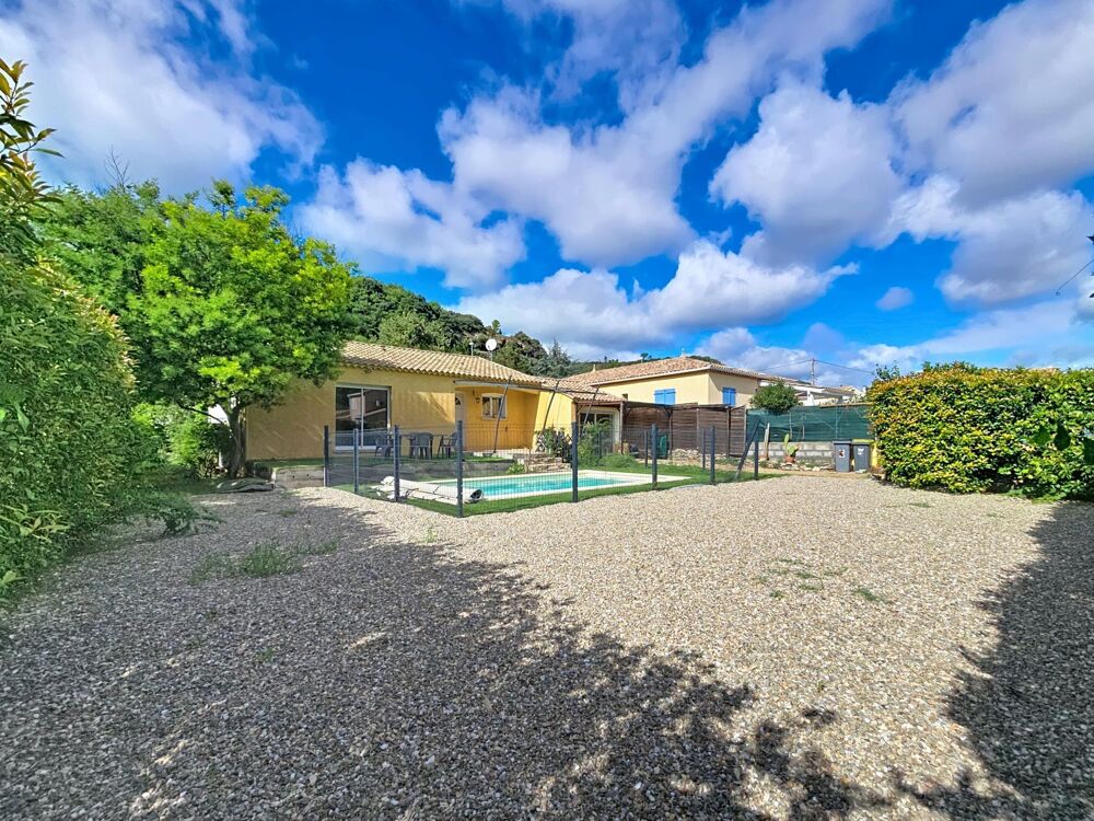 Vente Maison Une agréable villa de plain-pied avec piscine, garage et jardin dans un quartier calme de Bédarieux. Bedarieux