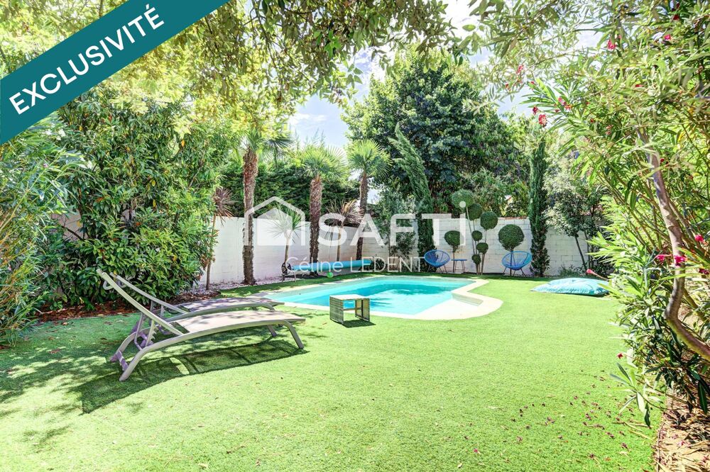 Maison de caractère haut de gamme de plus de 200m2 habitables avec jardin paysager et piscine chauffée