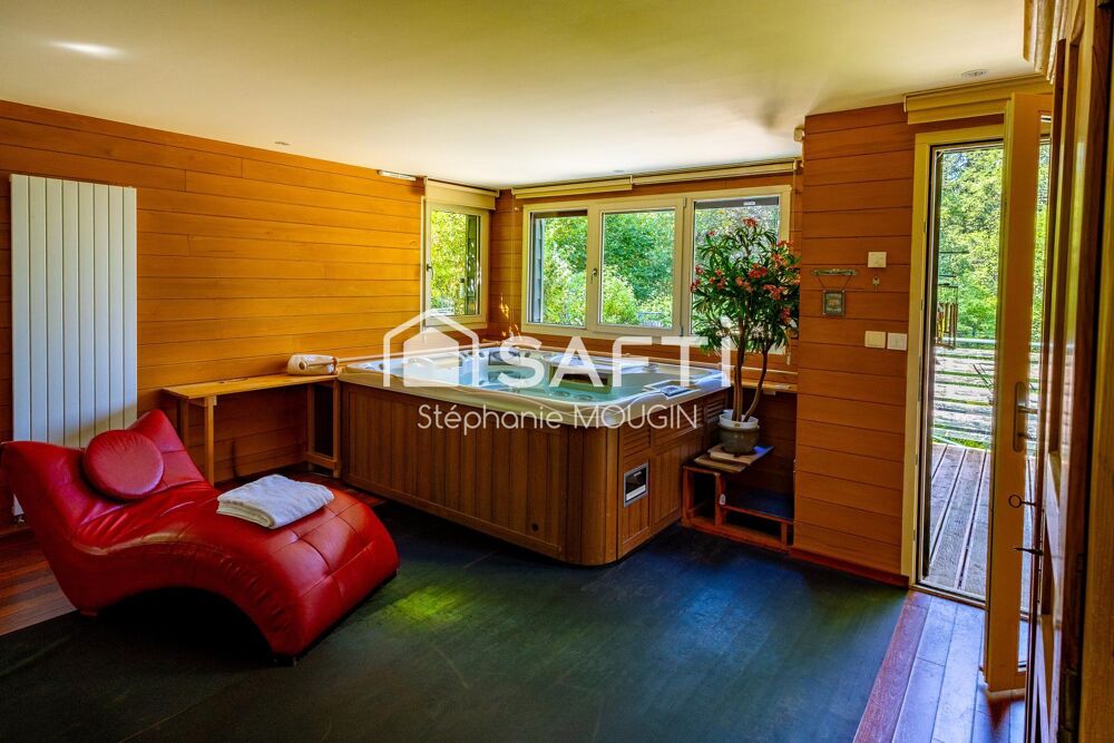 Vente Maison Propriété d'exception au cœur du Pays Horloger – Un domaine unique de plus de 805 m² habitables dans un ecrin de verdure. Le russey