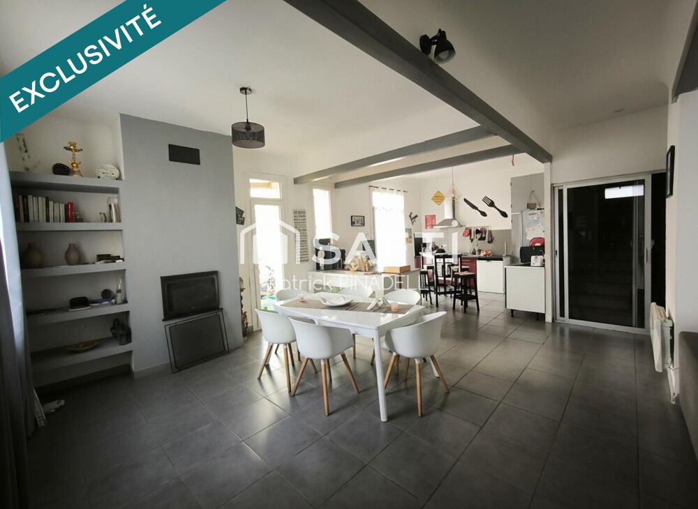 Maison d'habitation en trois faces, avec deux logements : un T5 avec quatre chambres, grande pièce de vie et T2 loué à l'année a