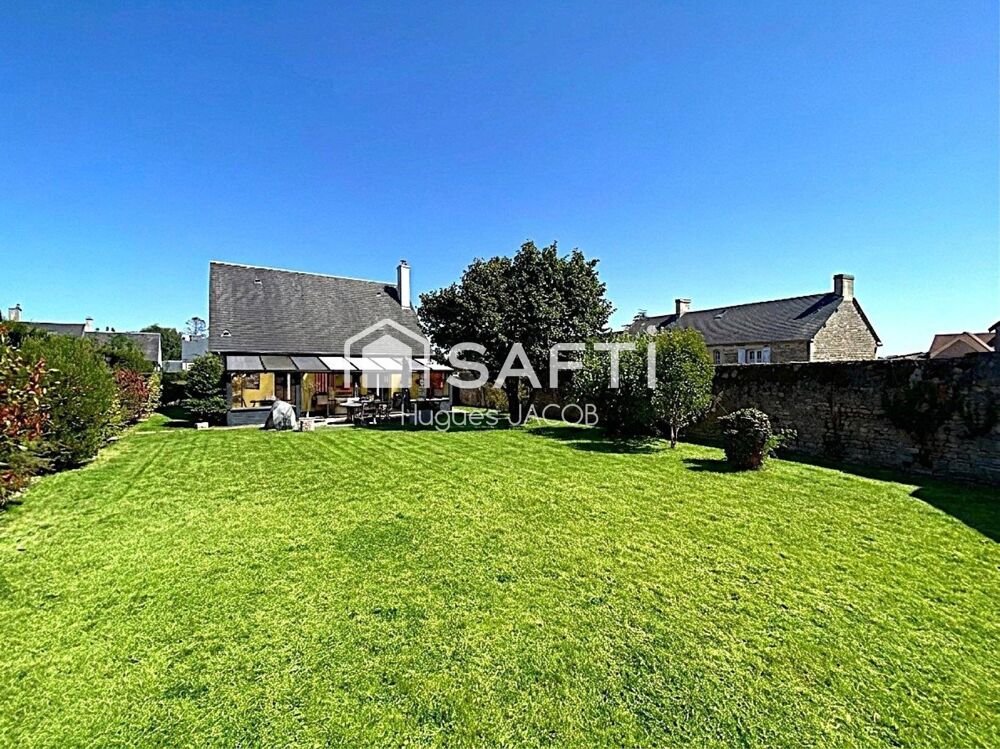 Proche toutes commodités maison avec 4 chambres, véranda et sous-sol