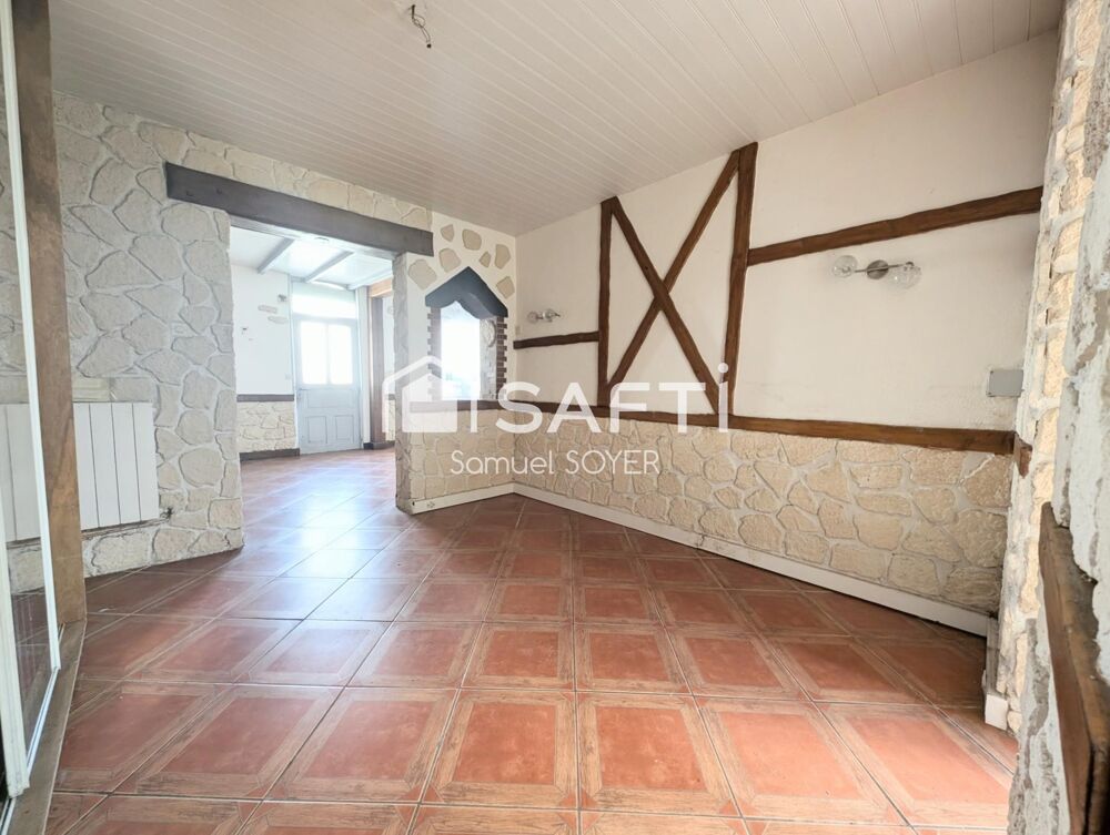 MAISON SEMI-MITOYENNE AVEC JARDIN