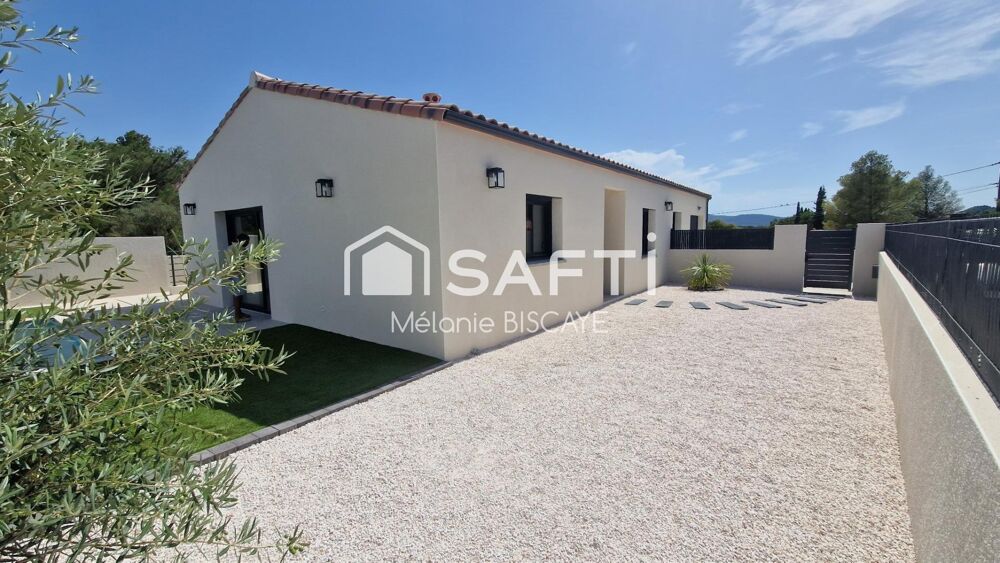 MAISON DE PLAIN PIED AVEC PISCINE GARAGE ET SOUS-SOL