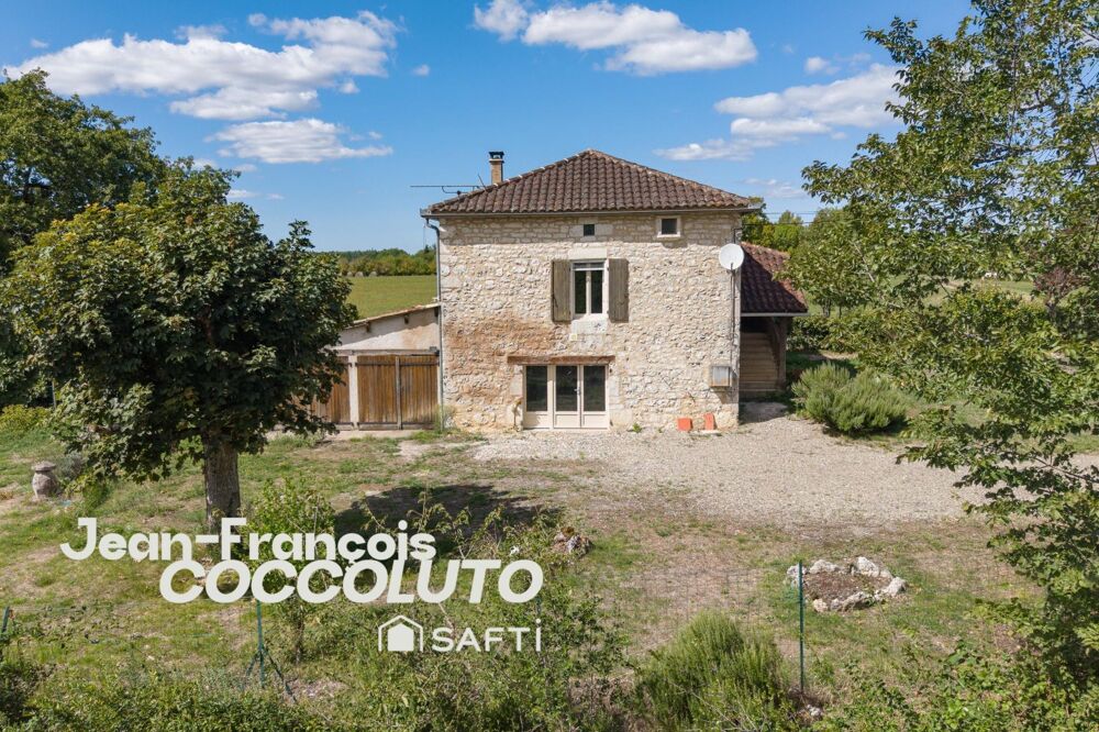 Vente Maison Maison ancienne en pierre de 65 m² avec deux chambres, garage, cave et jardin arboré Porte du quercy