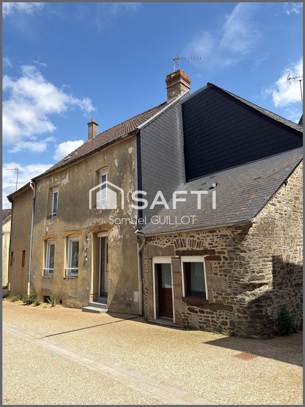 Maison de ville en pierre avec grand garage