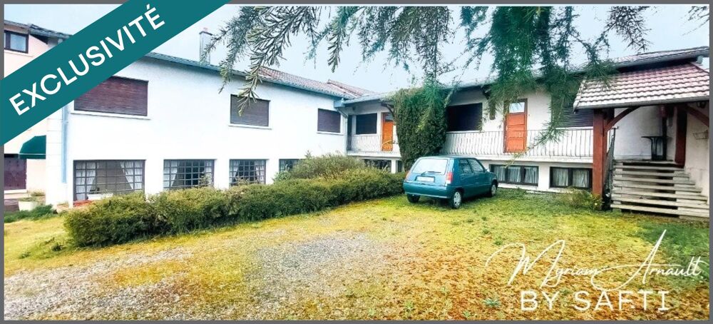   Immeuble 550 m², 10 chambres, salles de réception, bar, cuisine, grange, parking 