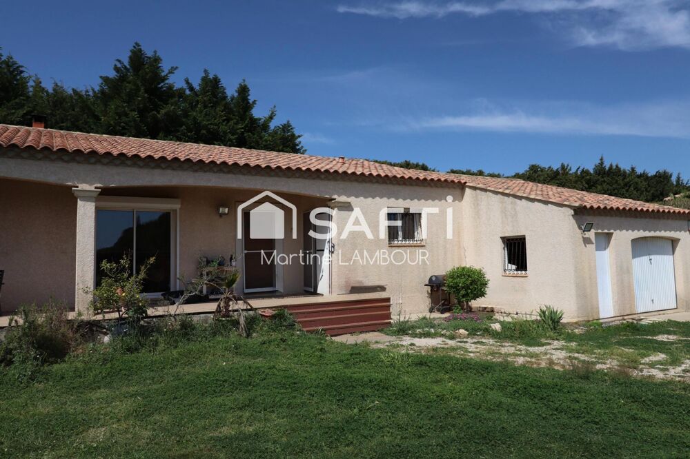 Maison T5 de plein-pied avec grand garage sur terrain plat 869 m² piscinable