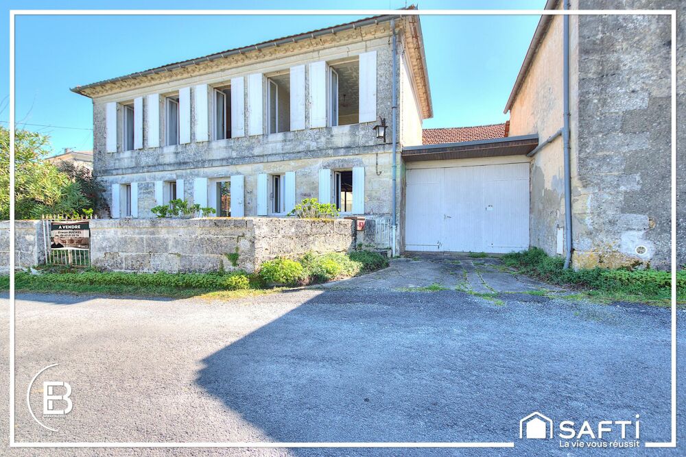 Maison en pierre et nombreuses dépendances