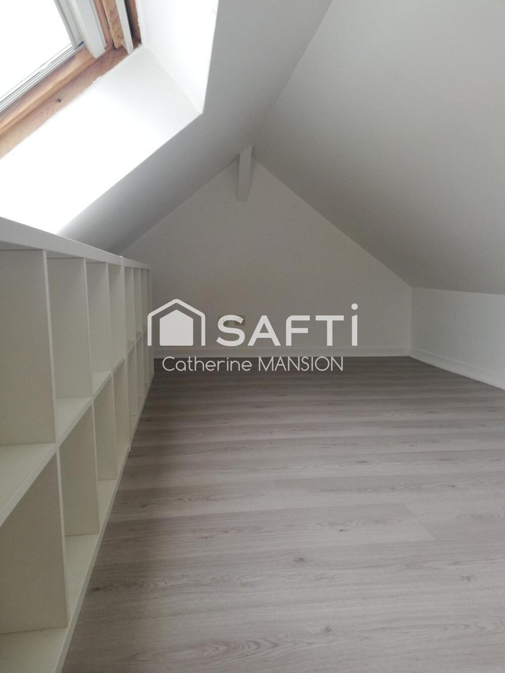 A vendre à Reims un appartement loué et une place de parking