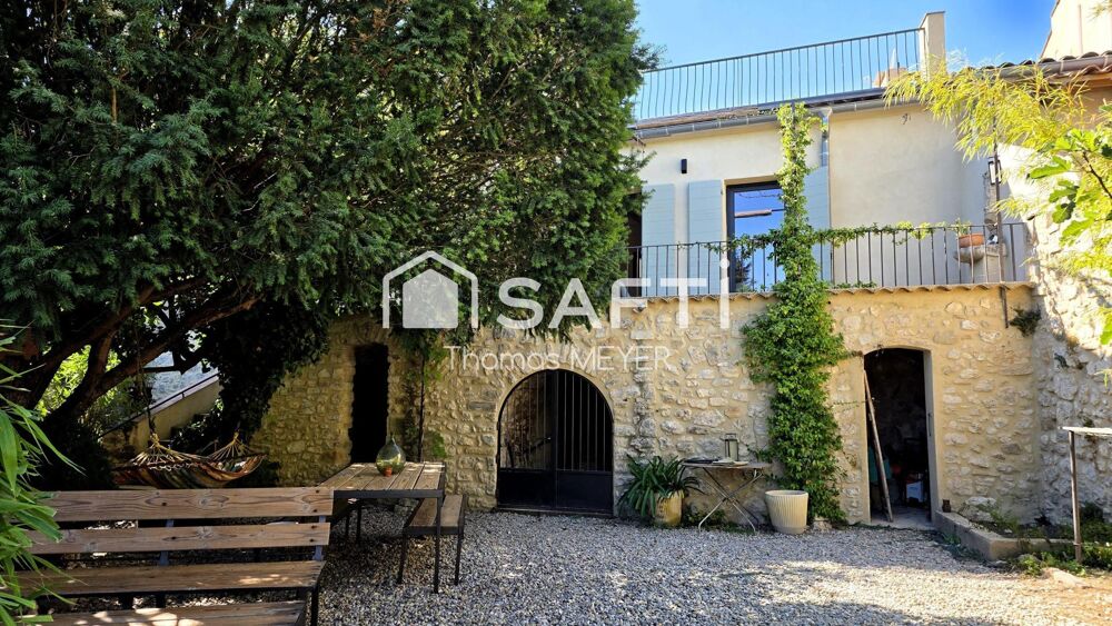maison de village avec jardin + garage + 4 caves