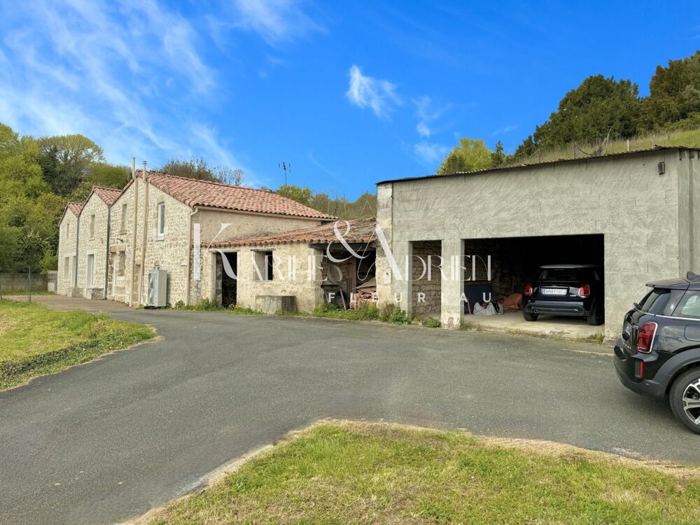 Vente Maison Maison en pierre rénovée offrant 3 chambres, jardin, dépendances et garage Fontenay-le-comte