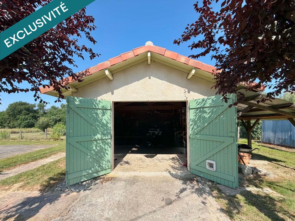 MAISON PLAIN PIED AVEC GRAND GARAGE ET TERRAIN CLOS