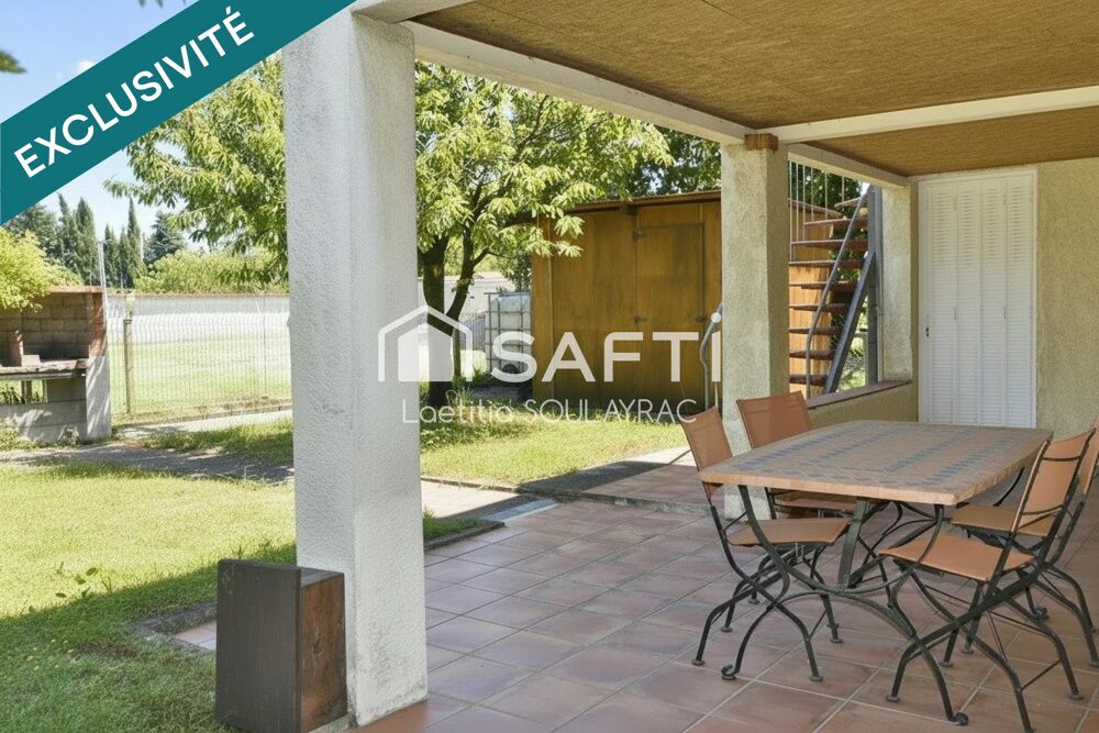 Maison 110 m² avec grand garage et jardin.