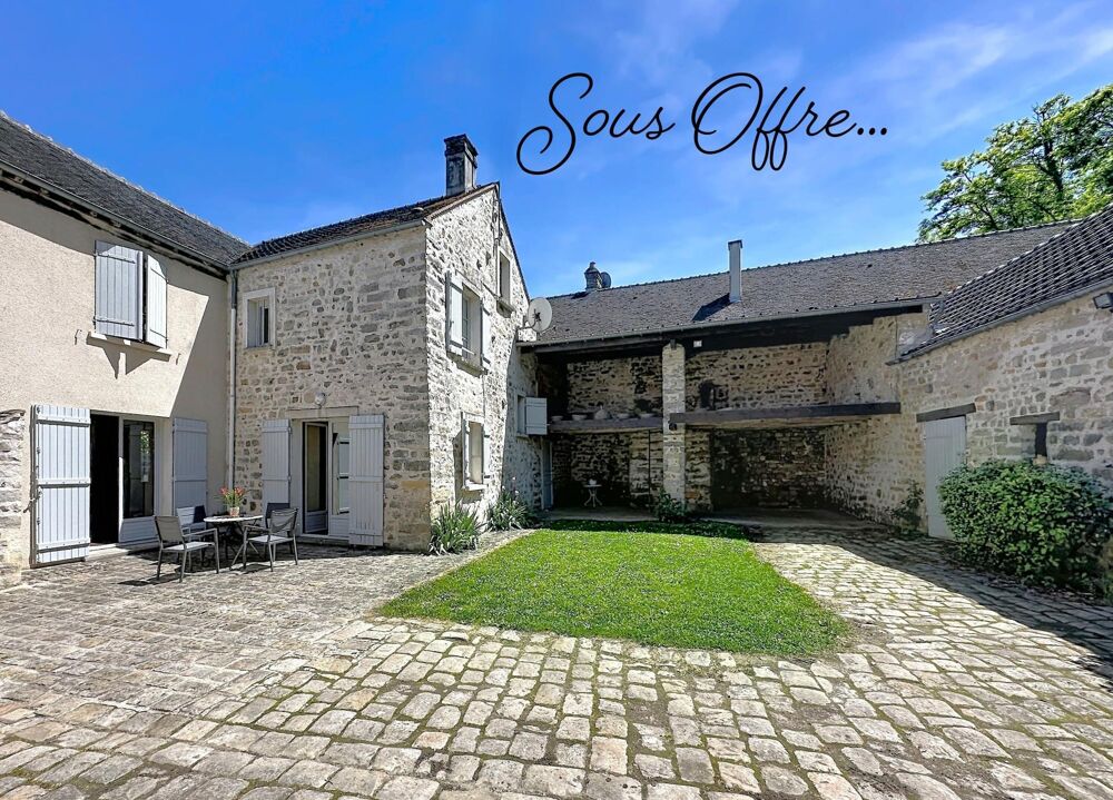 Maison en pierre avec grange