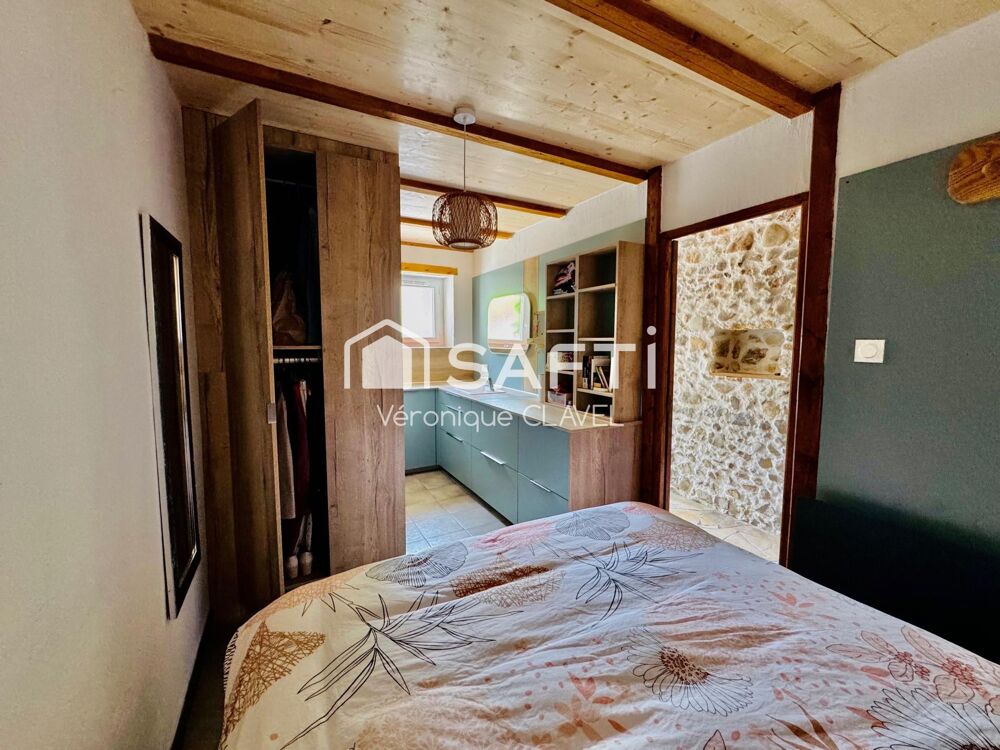 Vente Maison Maison de village  en pierre apparentes de 109m2 récemment rénovée avec patio et Garage de 40m2 Cardet
