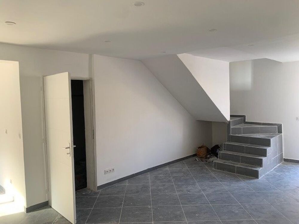 Maison mitoyenne neuve 98 m2 trois chambres
