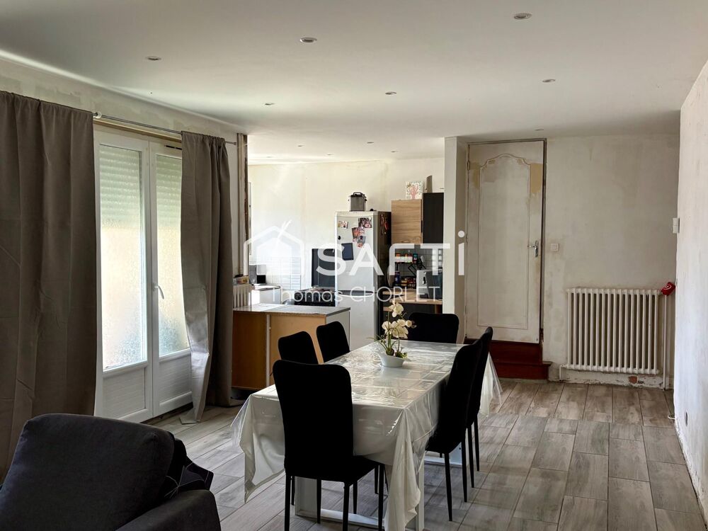 Maison de ville avec jardin et beau potentiel