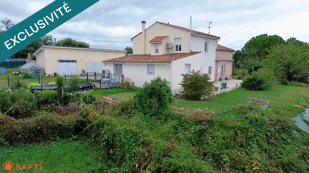 Maison familiale avec dépendances, vaste terrain et vue dégagée sur le Lot