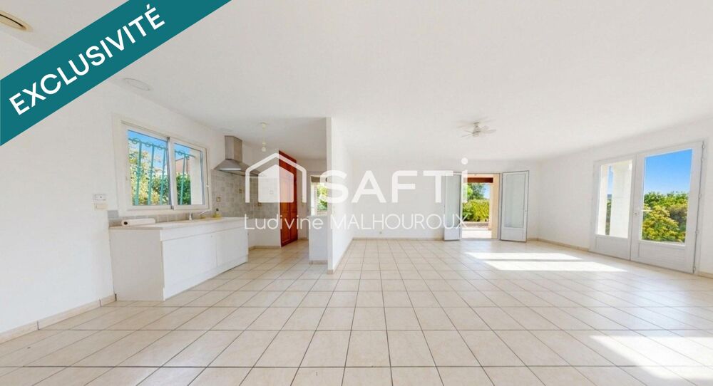 Maison de plain-pied  3 chambres  un garage - Terrain clos 