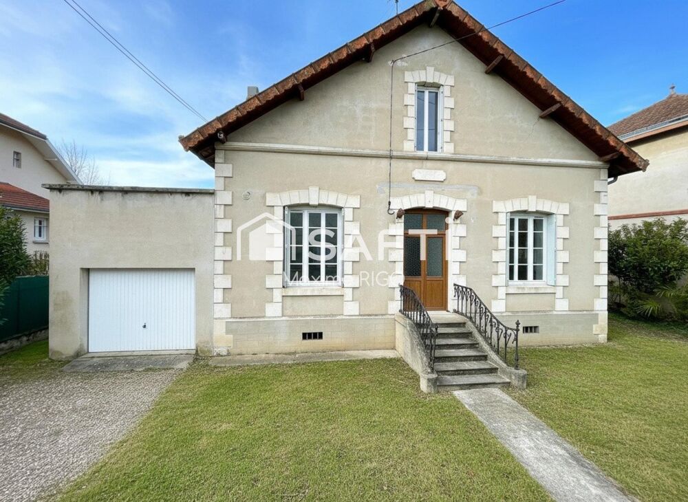 Maison de ville 7 pièces avec garage et jardin