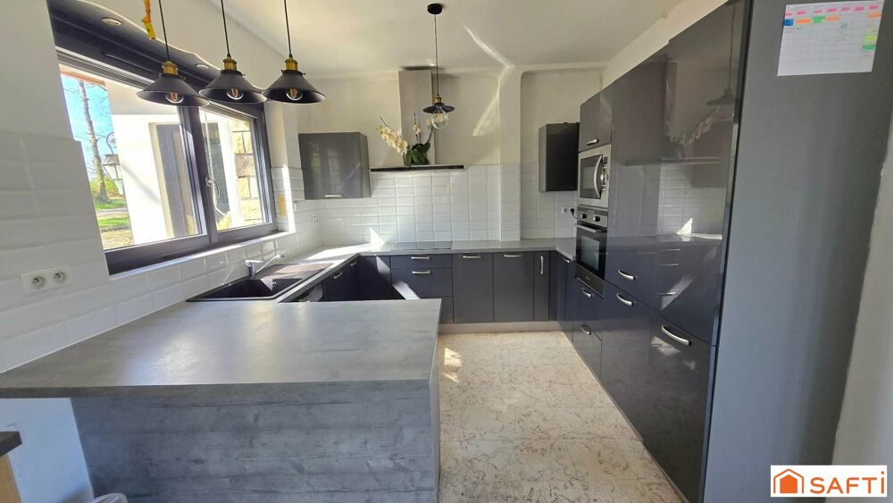 Maison rénovée avec volumes, dépendances et cadre nature