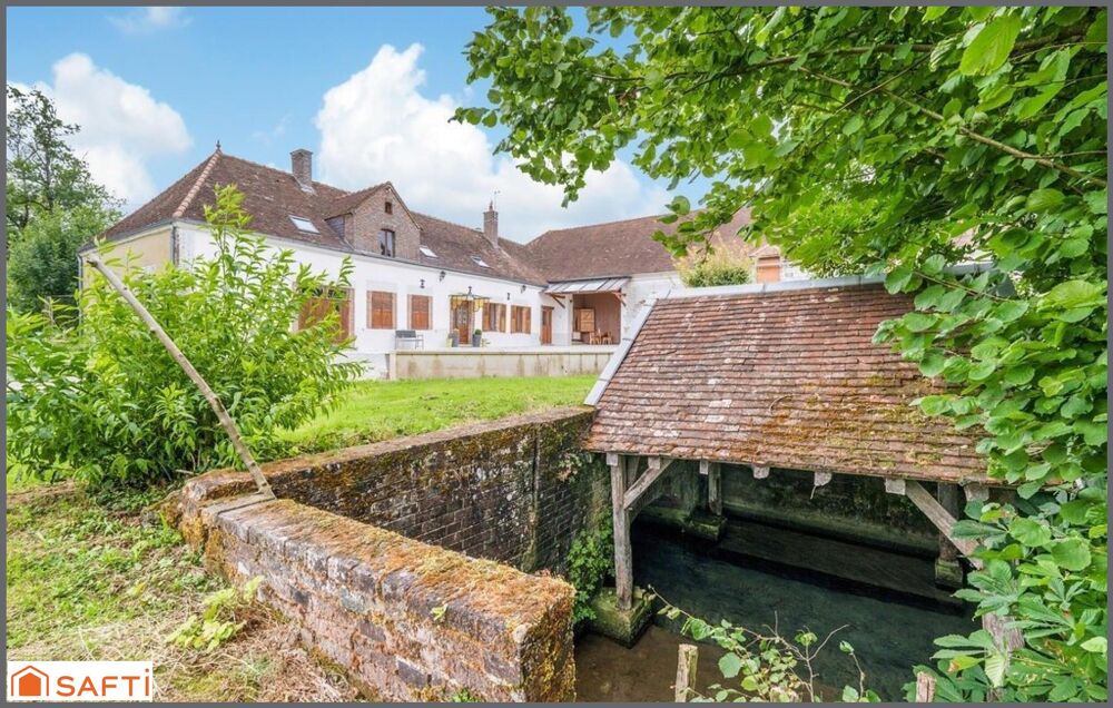 Ancien moulin avec étang et son cours d'eau