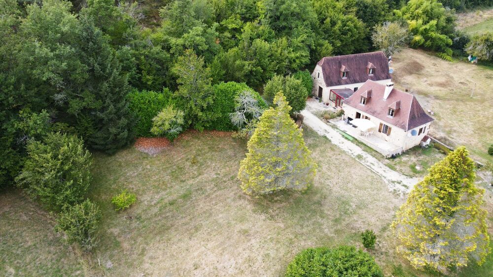 Ancien moulin avec ruisseau sur la propriété