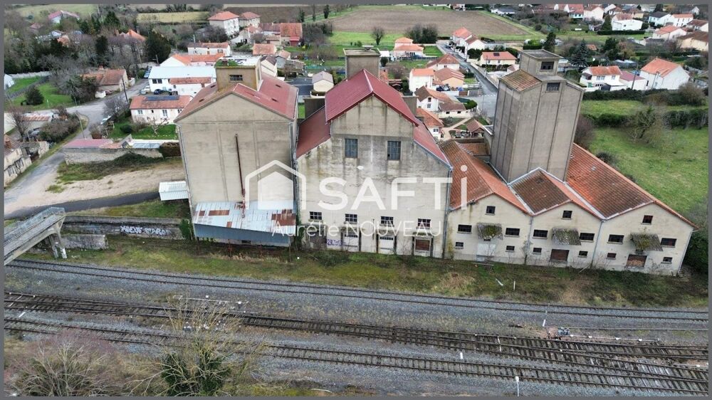   Bâtiment de 2000m² sur 5000m² de terrain constructible 