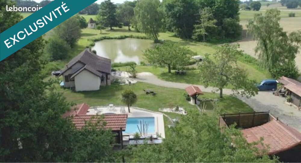 Maison avec étang privé, piscine et dépendances