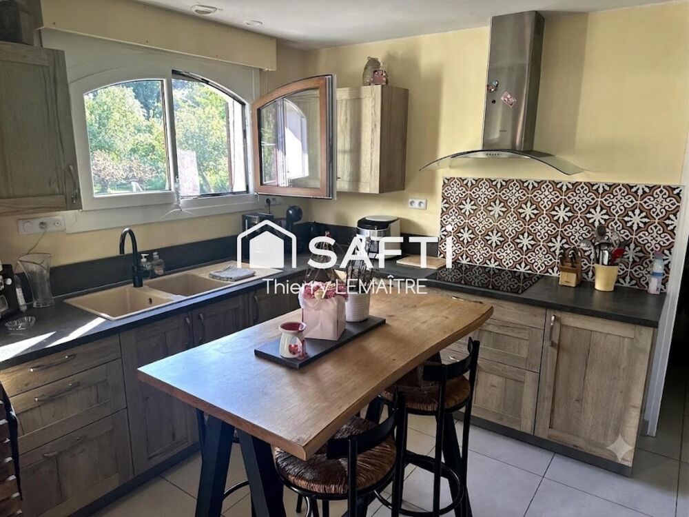 Vente Maison Terrain de 8000 m2 et sa maison dans le quartier du Marais à Guines. Guines