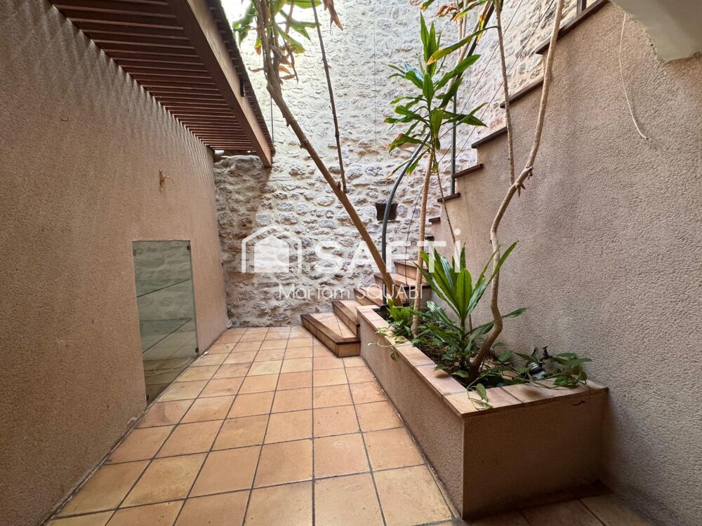 Vente Maison Maison de caractère 220m2, jardin, terrasse, places de parking privatives Clermont-l'herault