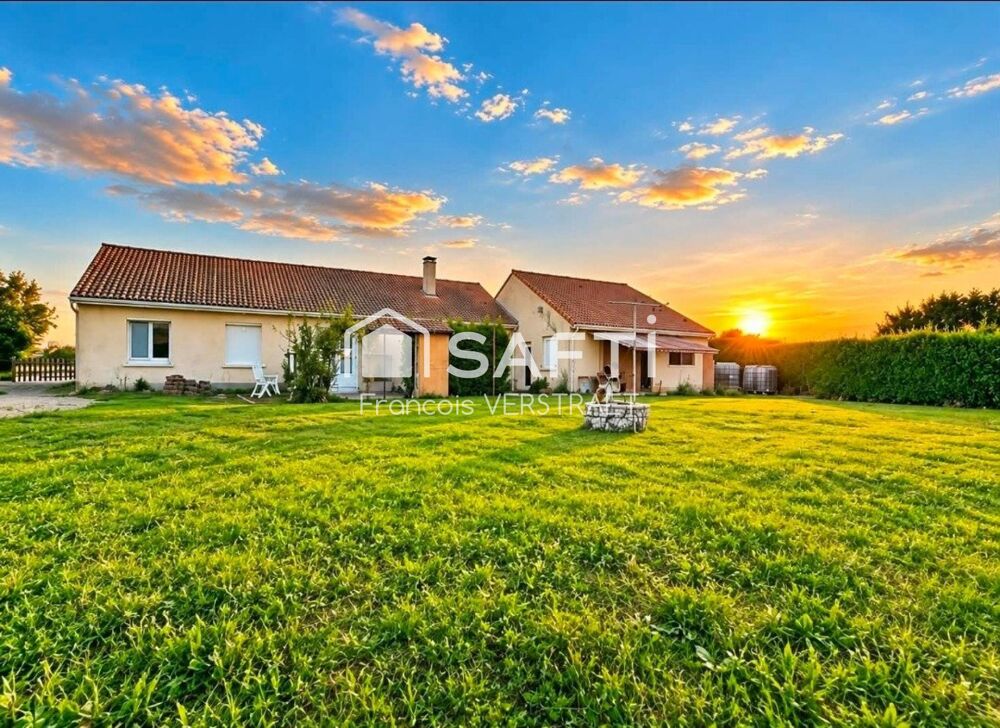 Maison individuelle de plain pied , garage , grand jardin