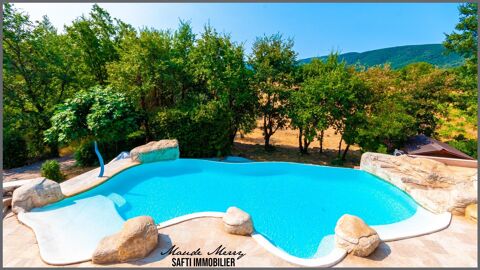   Villa 165 m2 - 2 s�jours/cuisines - 4 chambres - piscine lagon - belle vue d�gag�e - parcelle de plus de 6000 m2 dont 3500 m2 pl Maison - 6 pi�ce(s) - 165 m�