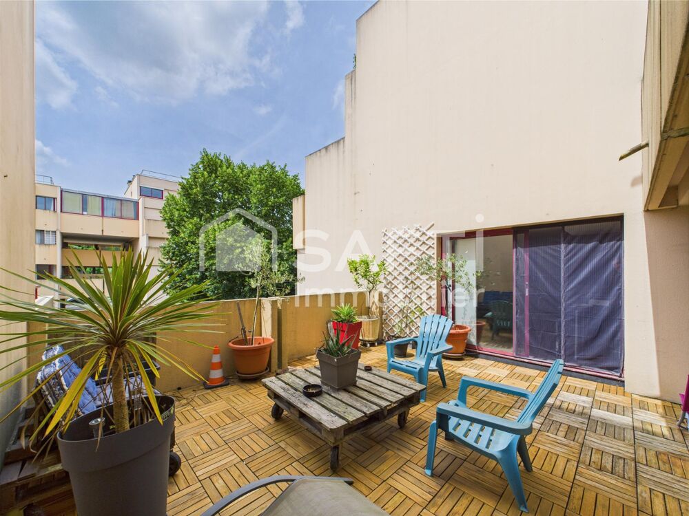Grand T4 lumineux avec terrasse et garage, au calme.