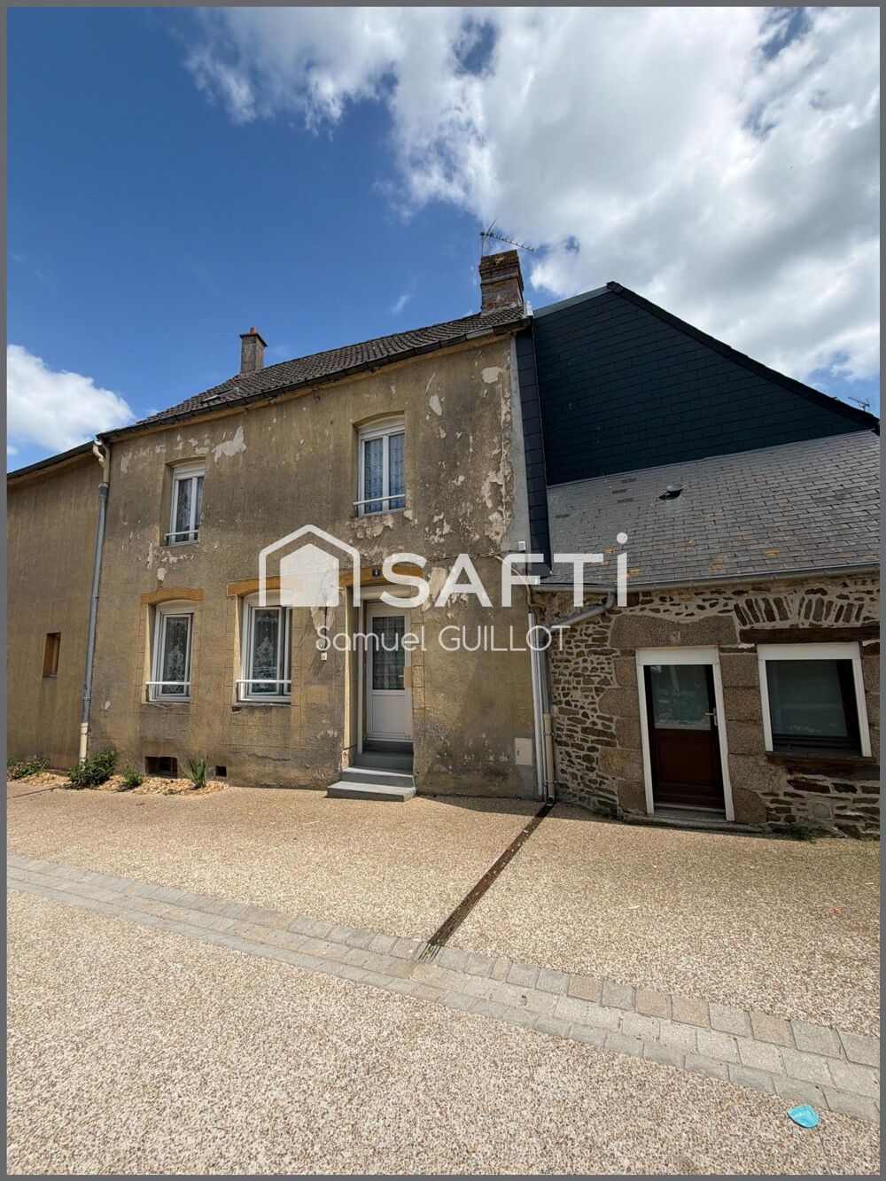 Maison de ville en pierre avec grand garage