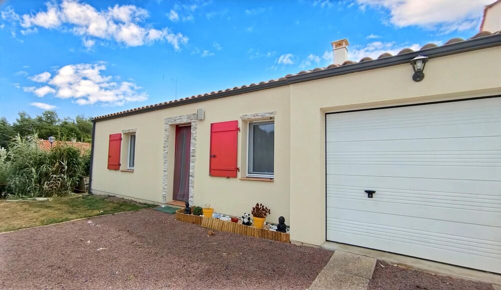 MAISON DE PLAIN PIED AVEC GARAGE DANS QUARTIER CALME